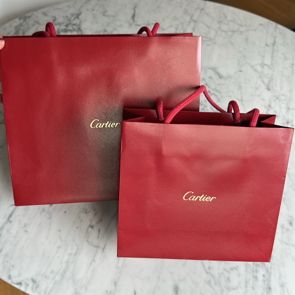 Two Cartier Shopping Bags